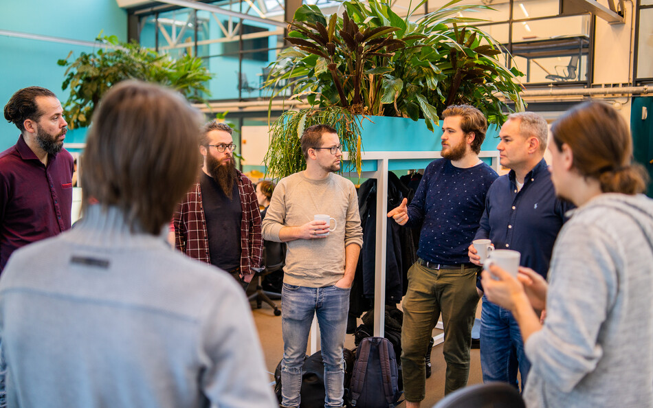 Foto van een SWIS team tijdens de daily standup